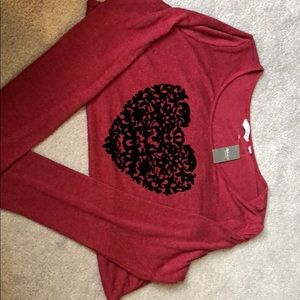 Long sleeve red sweater with velvet heart.